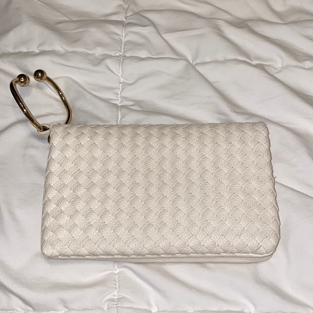 Cute wristlet/clutch new condition, never carried.